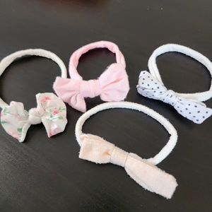 3/$12 ● 4 headbands 0-12m
